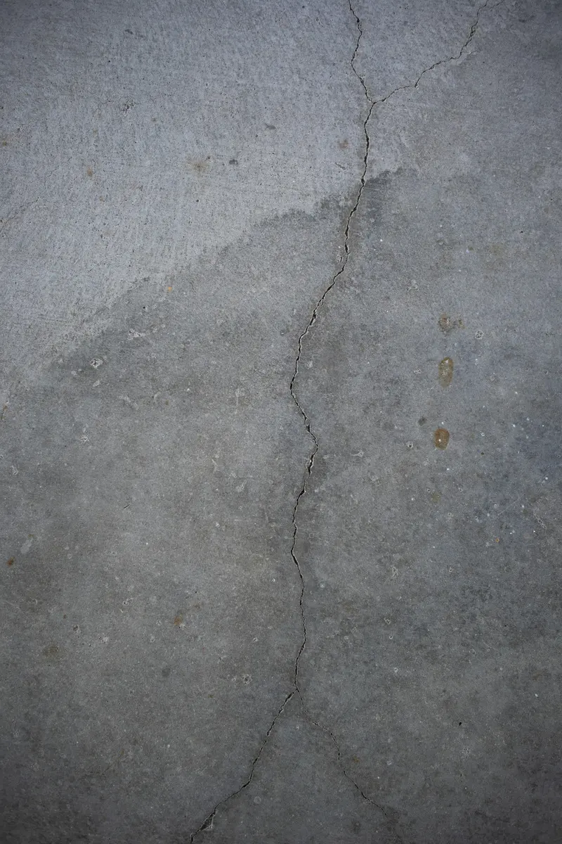 Vertical crack running down a poured concrete wall